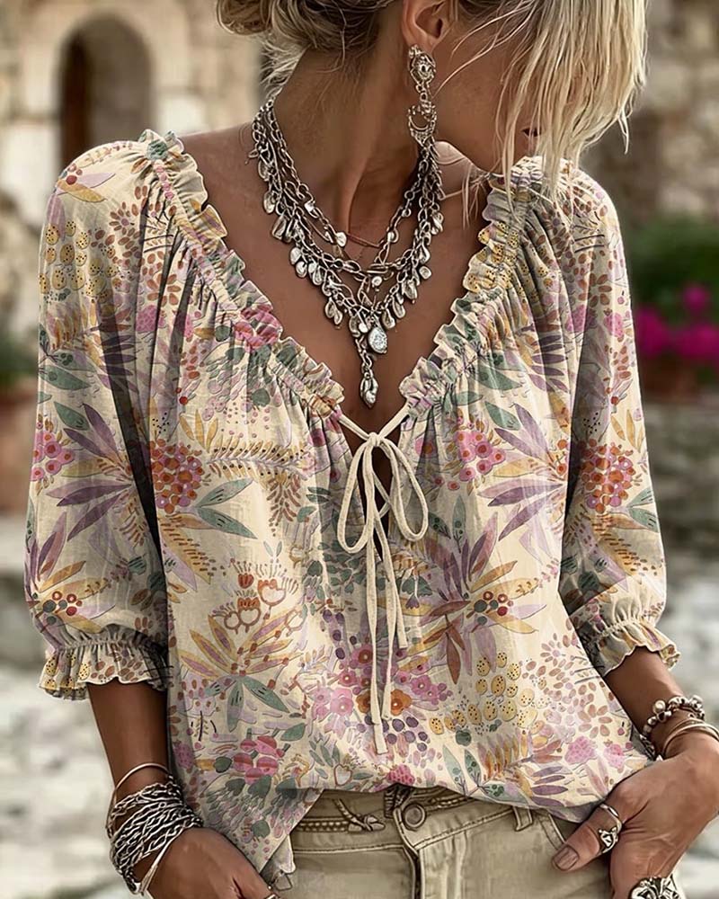 Blusa con escote en V y lazos