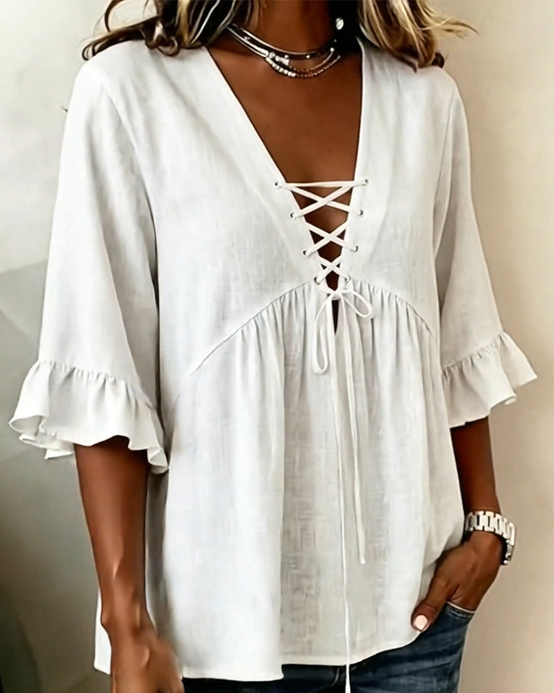 Blusa Unie con escote en V y volantes