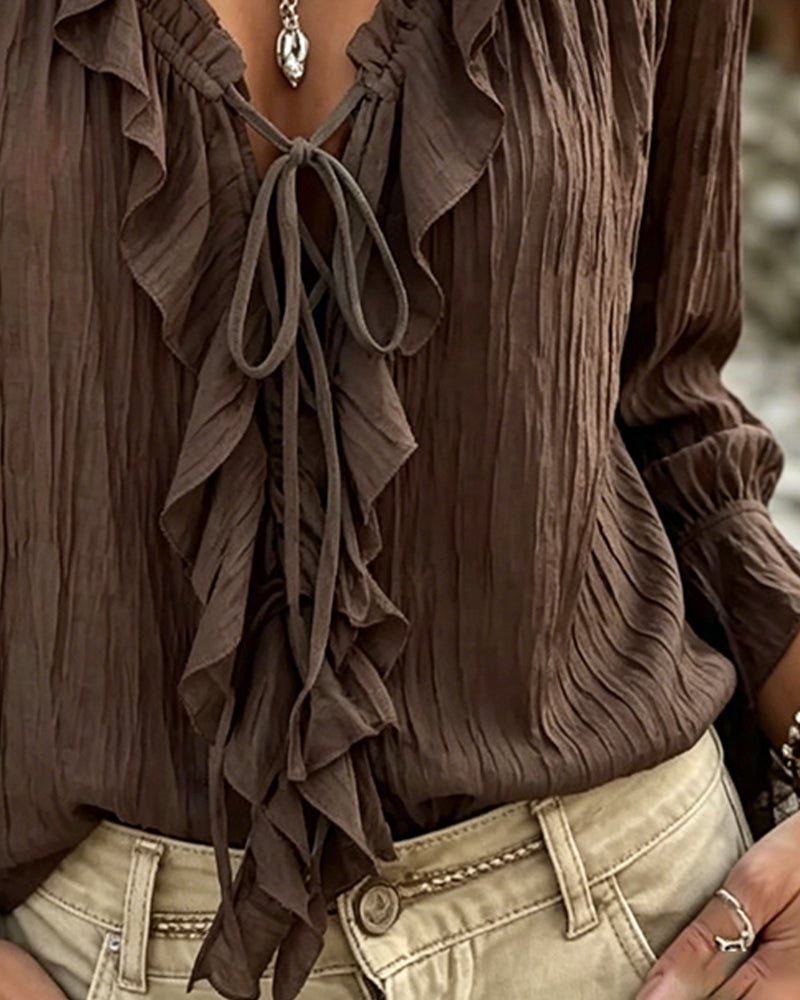Blusa de manga larga con volante y ribete de encaje