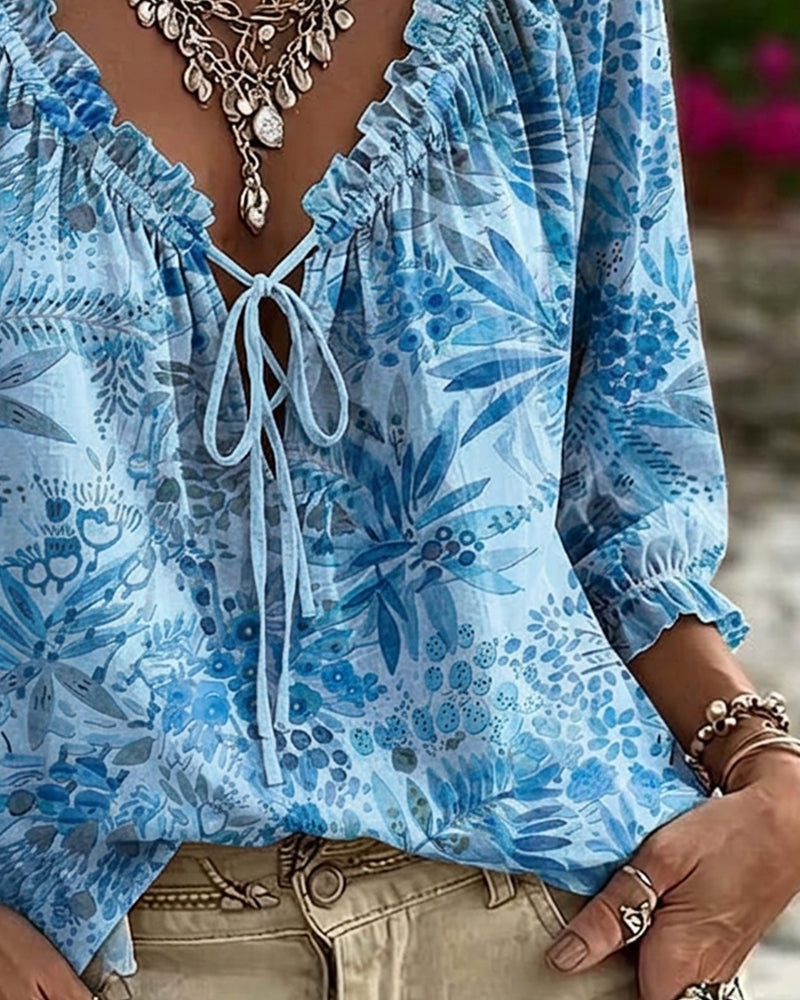 Blusa con escote en V y lazos