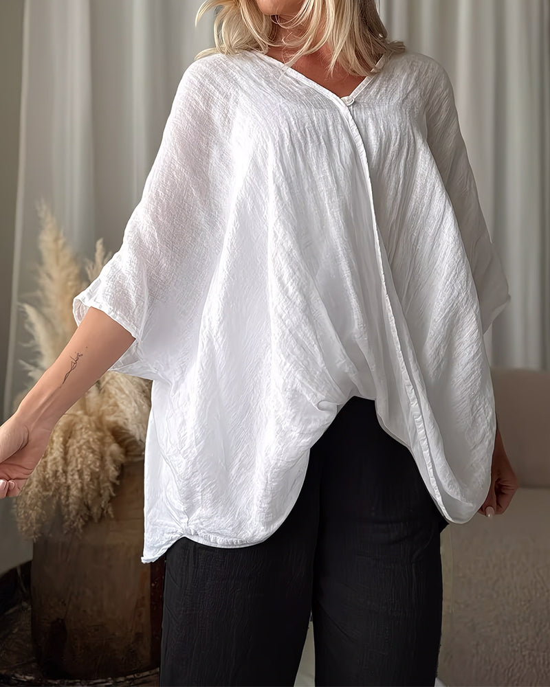 Blusa holgada de manga murciélago, color sólido