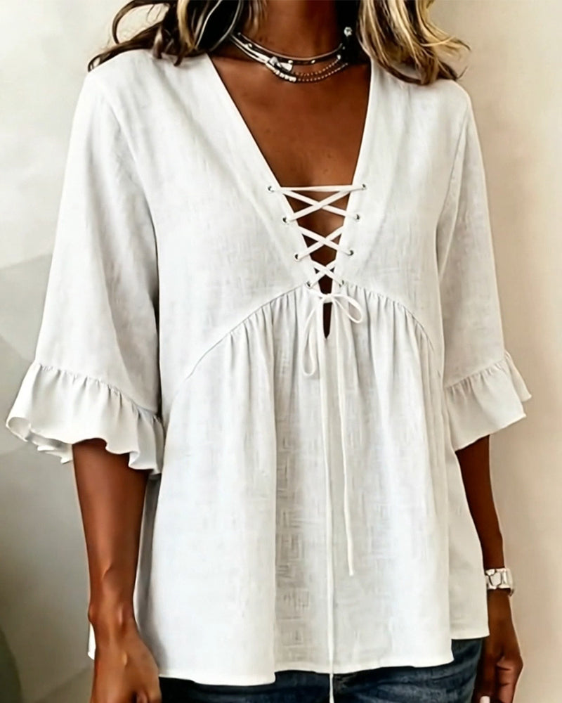 Blusa Unie con escote en V y volantes