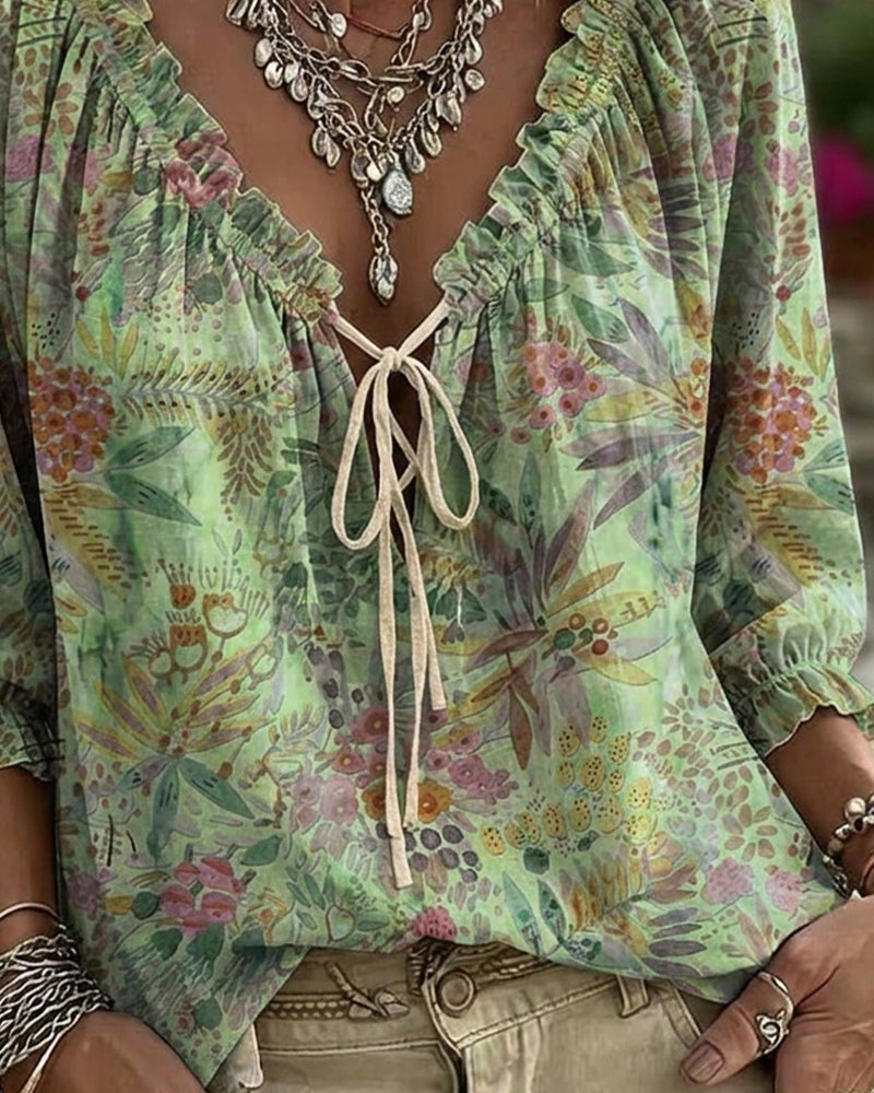 Blusa con escote en V y lazos