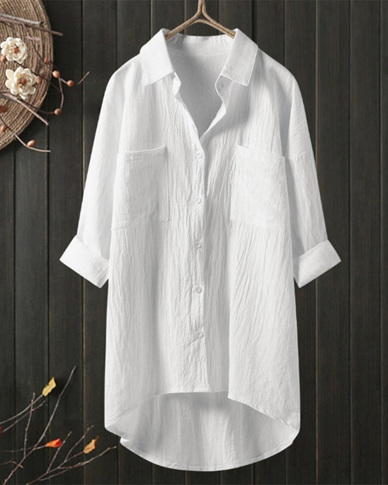 Blusa amplia de color sólido con mangas largas