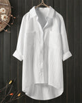 Blusa amplia de color sólido con mangas largas