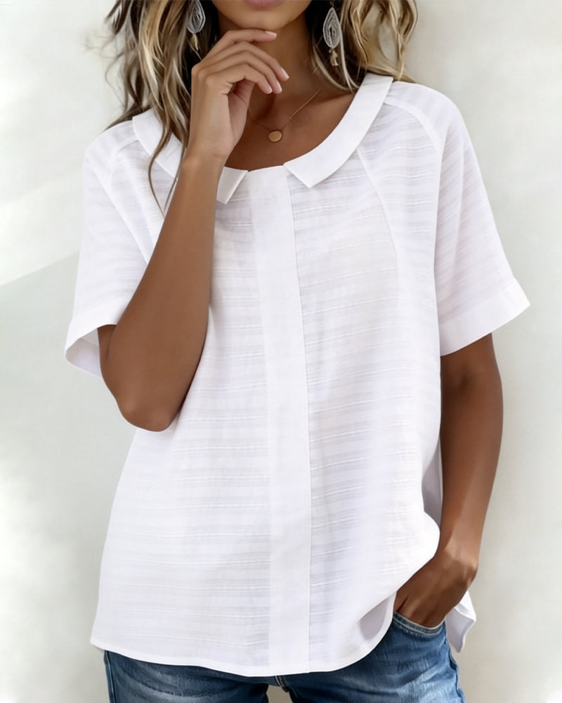 Blusa texturizada con cuello Peter Pan
