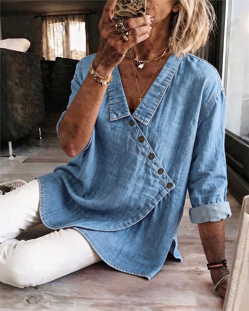 Blusa lisa con botones diagonales, cuello y mangas largas