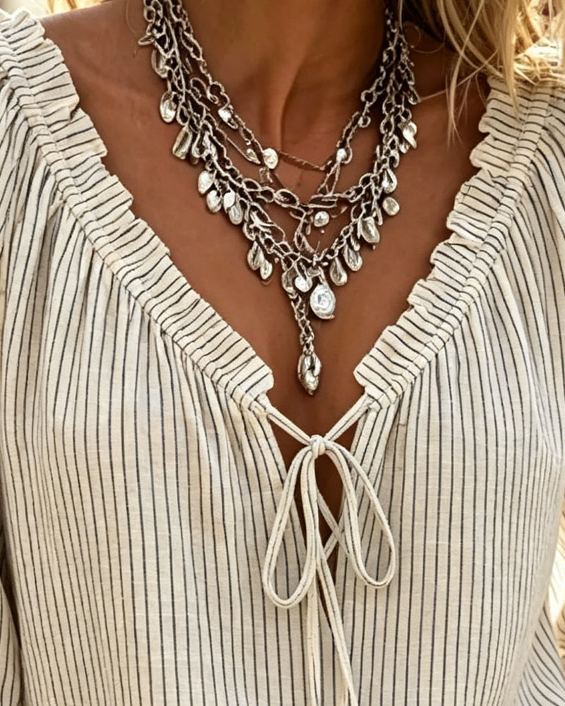 Blusa casual de mangas volantes con cordones