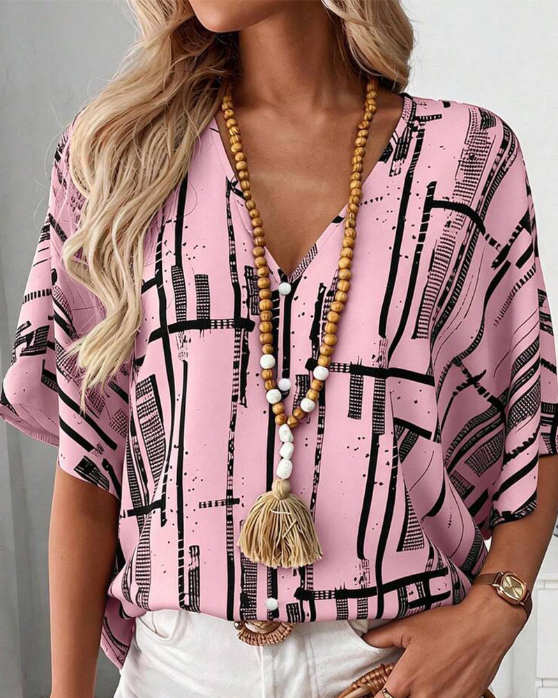 Blusa escote en V, corte recto, mangas murciélago