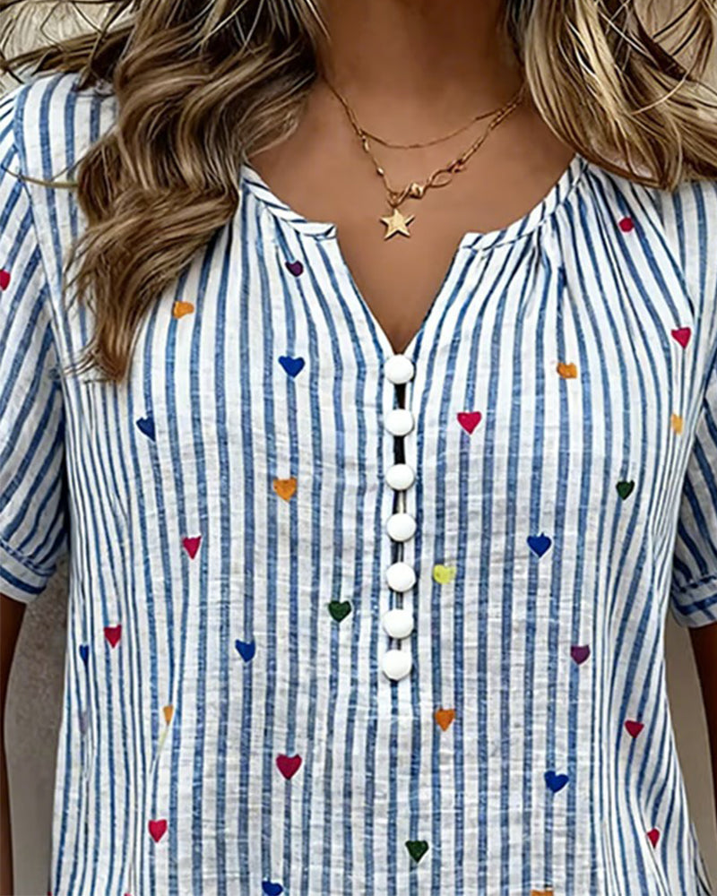Blusa de mangas abullonadas a rayas con corazón