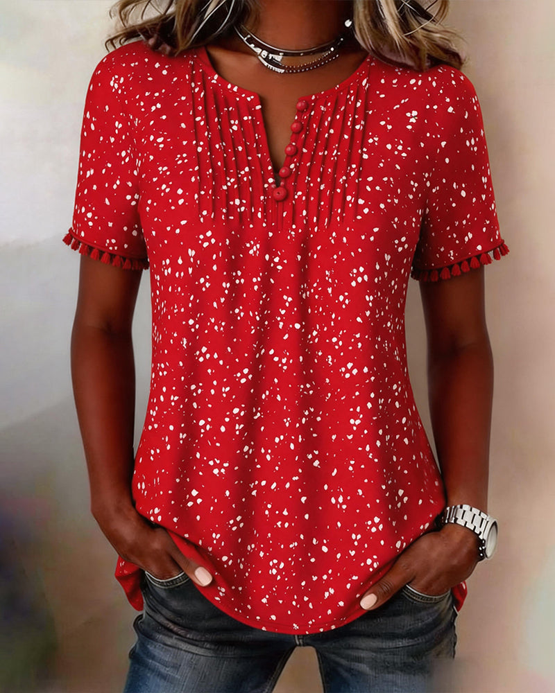 Blusa blanca de punto con flecos y mangas cortas
