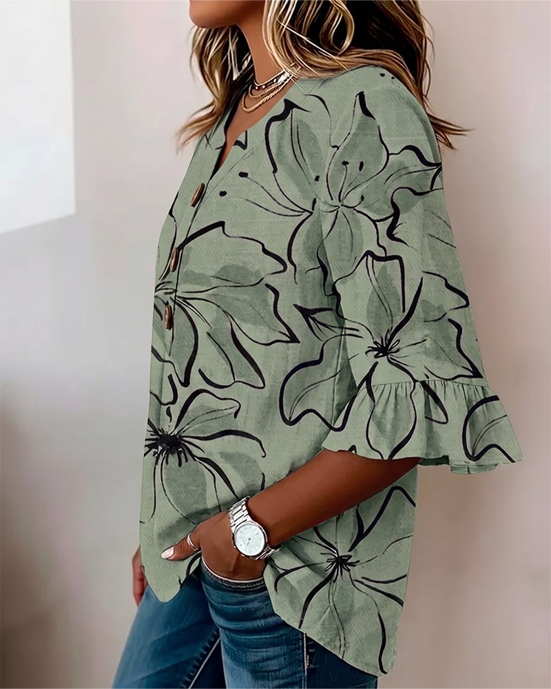 Blusa con escote en V, estampado floral y volante, manga 3/4
