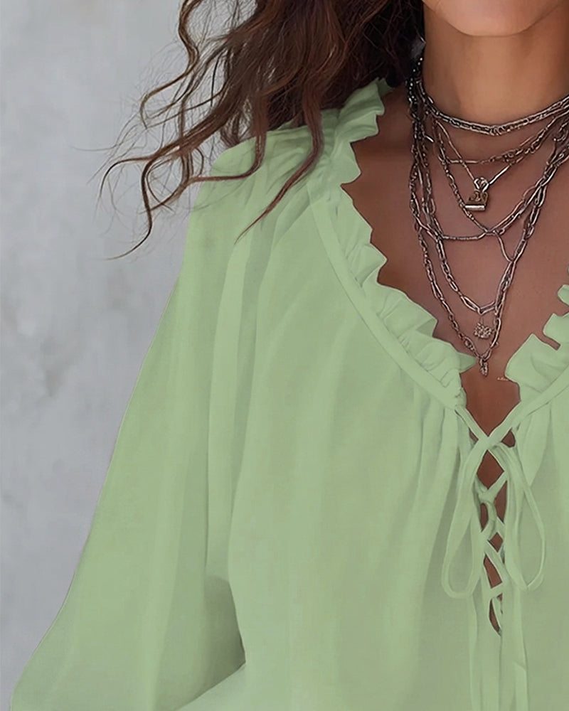 Blusa de cuello en V con lazos