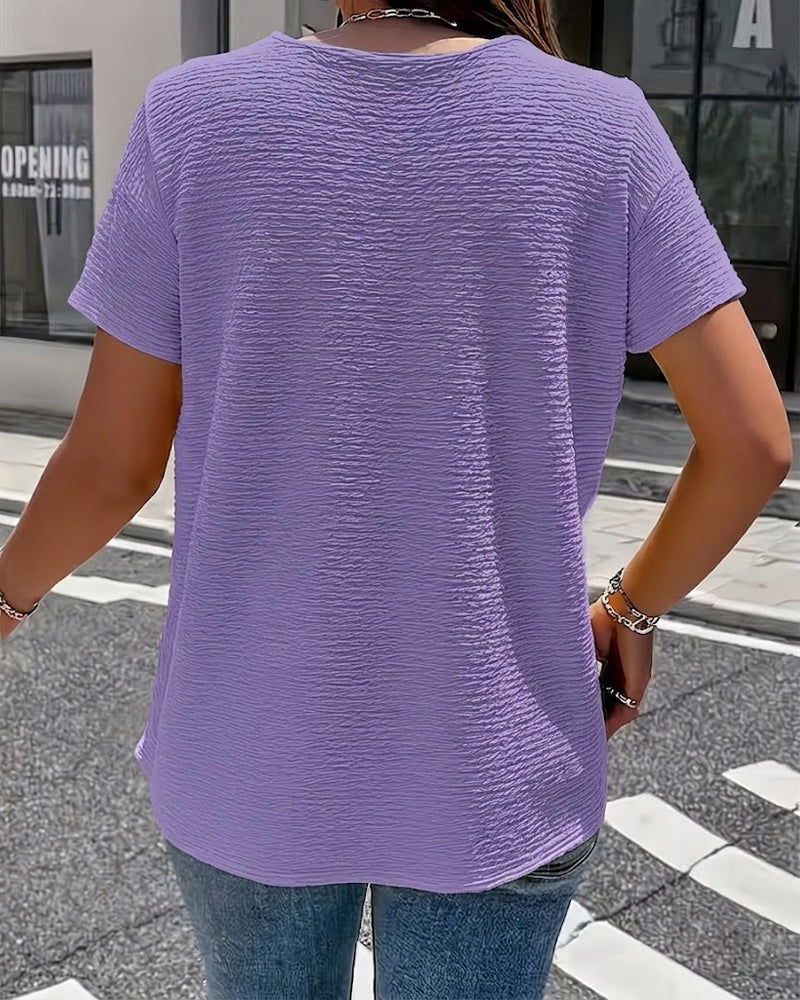 Camiseta con cuello Peter Pan y tres botones