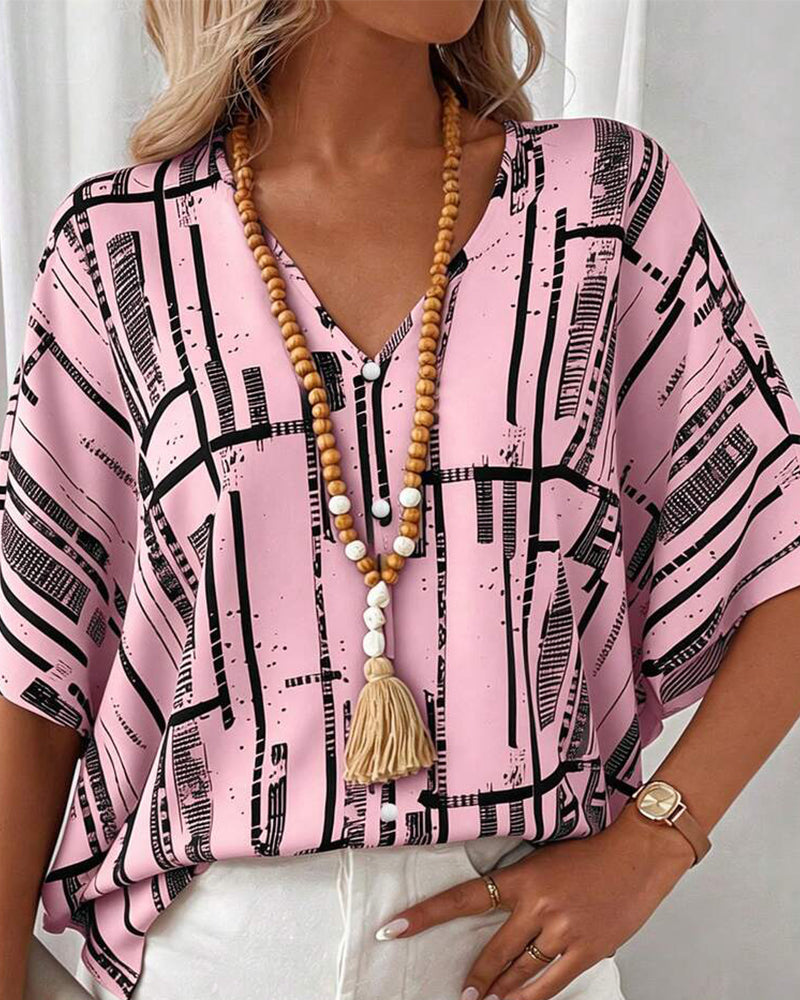 Blusa escote en V, corte recto, mangas murciélago