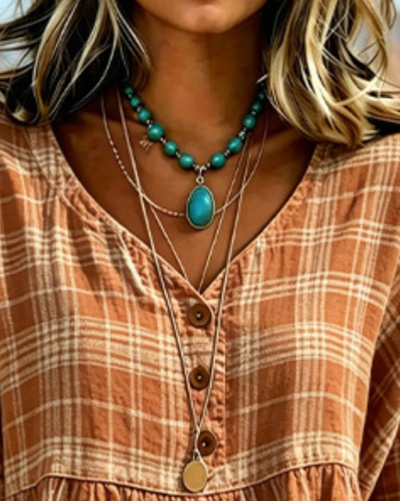 Blusa vintage de cuadros con escote en V