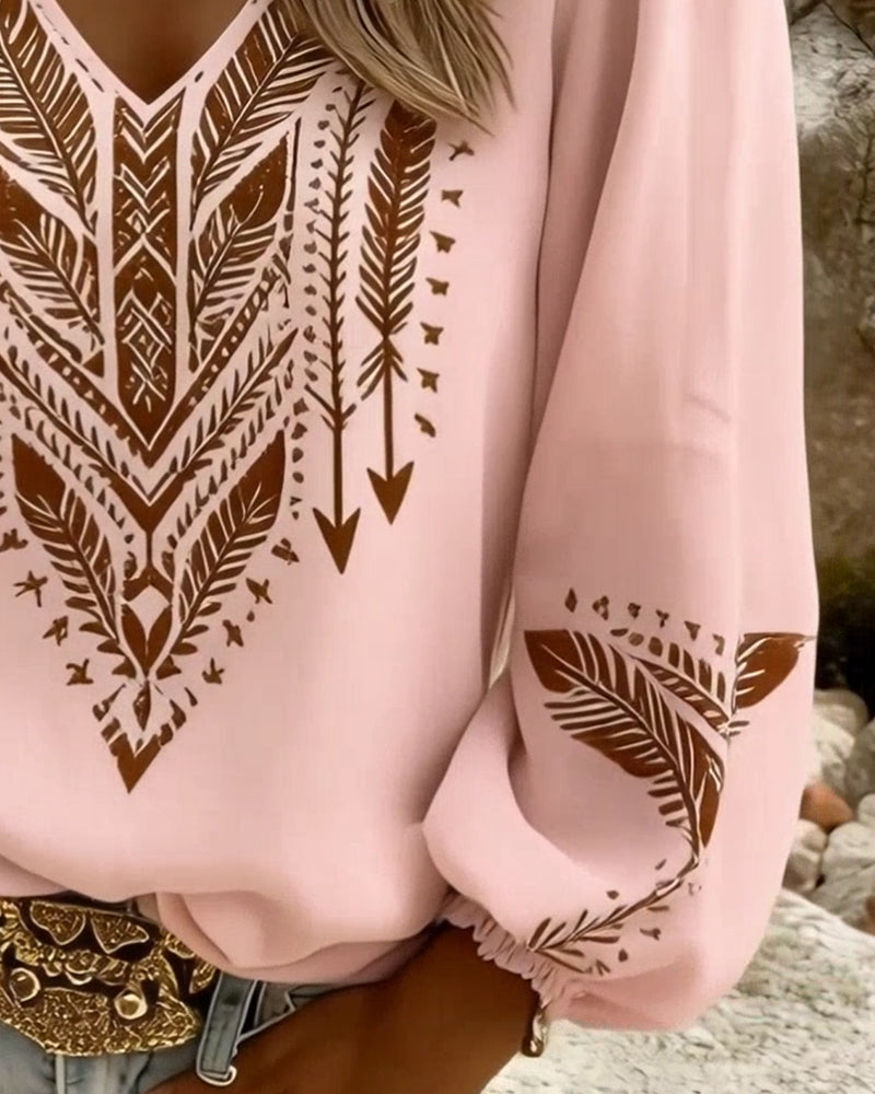 Blusa de manga abullonada con escote en V y corte amplio