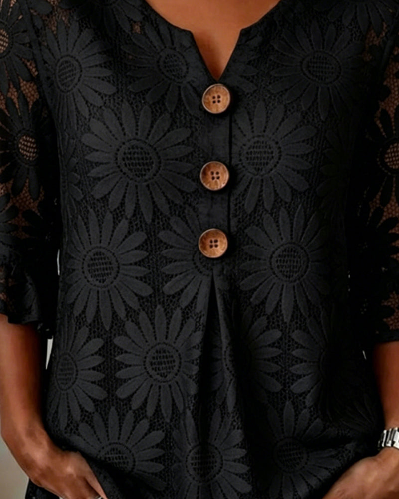 Blusa con estampado de margaritas y mangas con volantes