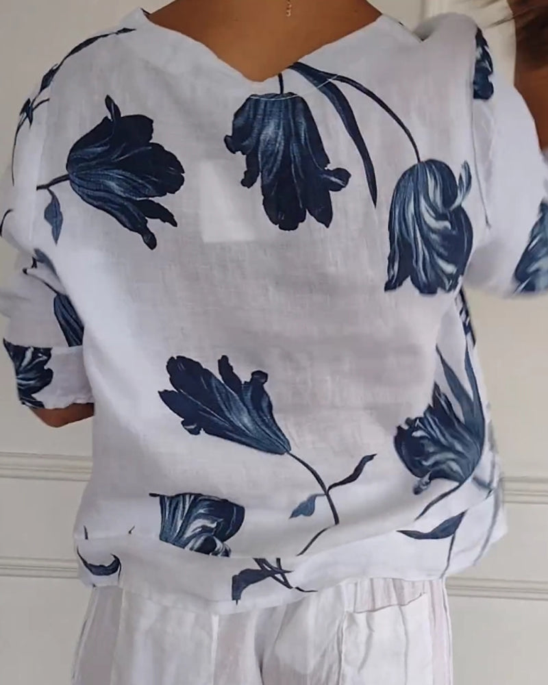 Top abotonado de algodón y lino con estampado floral