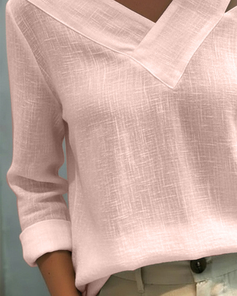Top elegante con escote en V y tirante caído