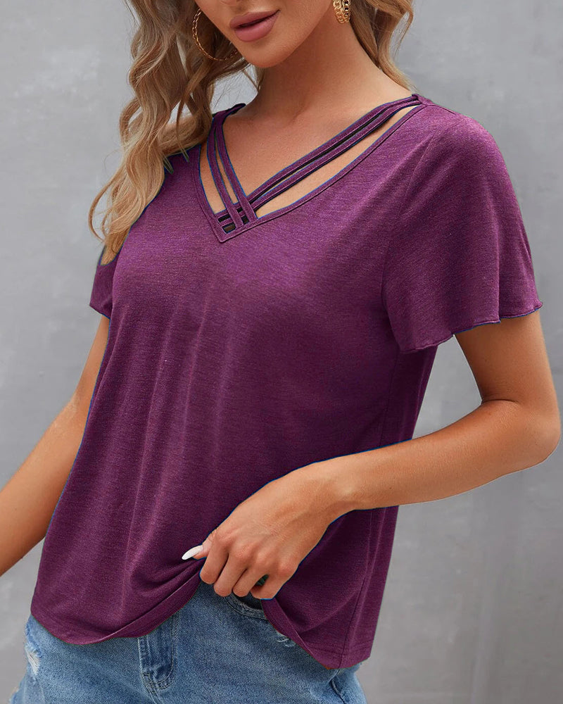 Camiseta con recortes de color sólido