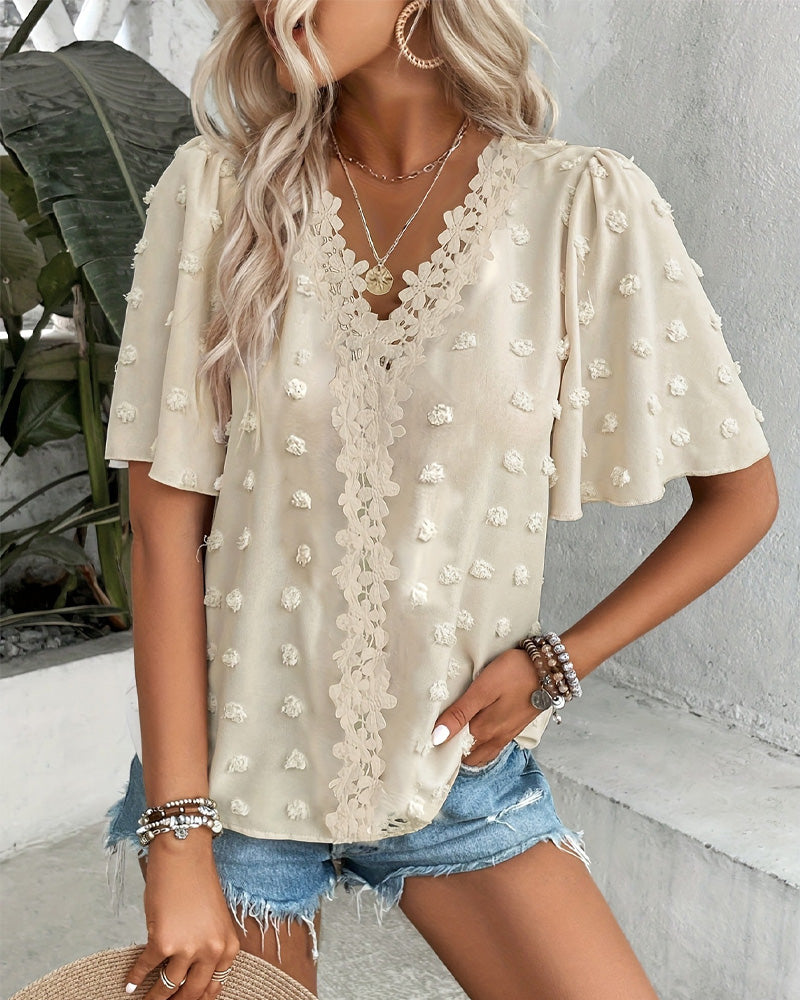Blusa jacquard con manga volante