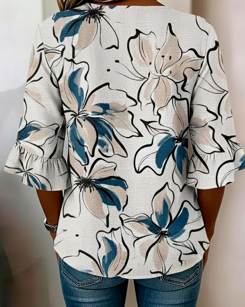 Blusa con escote en V, estampado floral y volante, manga 3/4