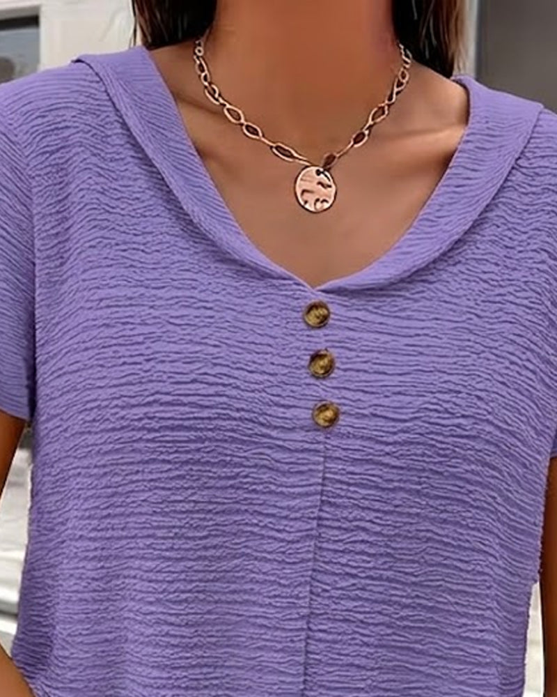 Camiseta con cuello Peter Pan y tres botones