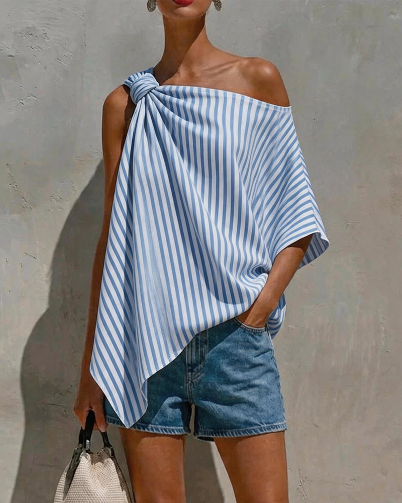 Blusa de rayas amplia con diseño asimétrico