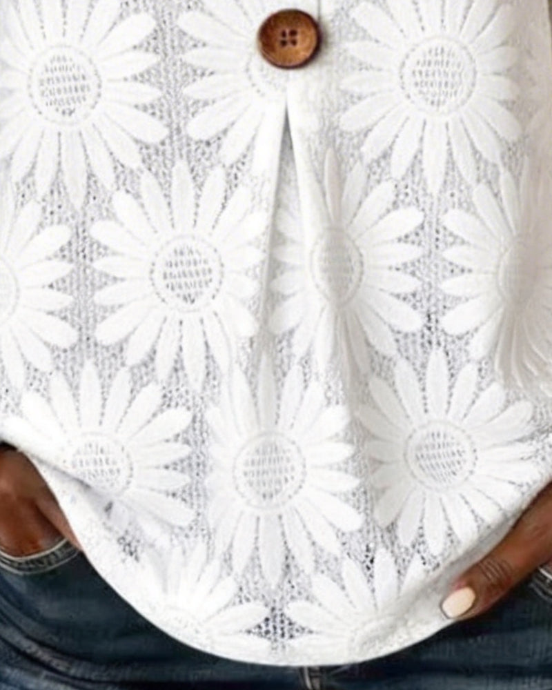 Blusa con estampado de margaritas y mangas con volantes