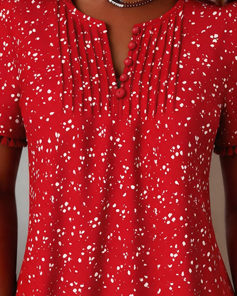 Blusa blanca de punto con flecos y mangas cortas