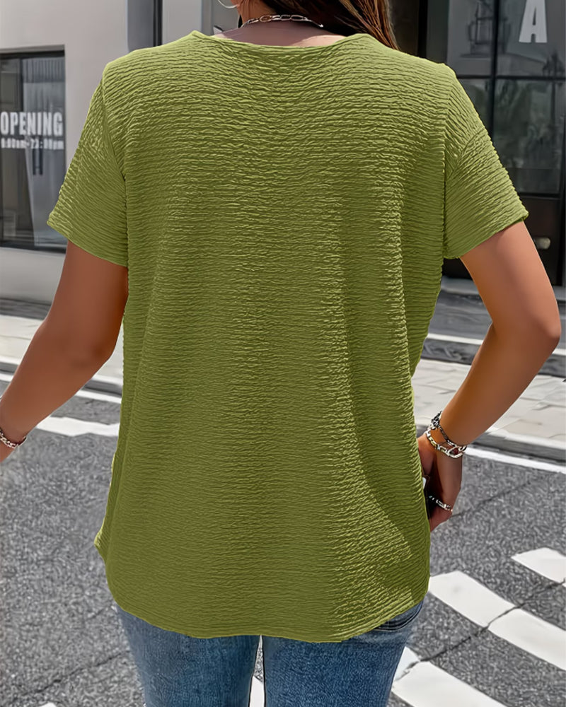 Camiseta con cuello Peter Pan y tres botones