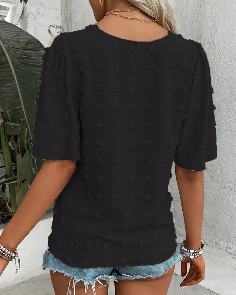 Blusa jacquard con manga volante
