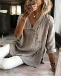 Blusa con cuello y botonadura diagonal asimétrica