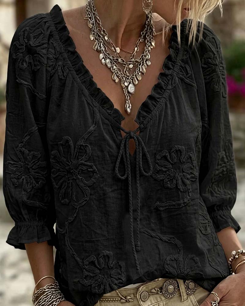 Blusa de algodón 100%, escote en V envolvente, con lazo y volantes