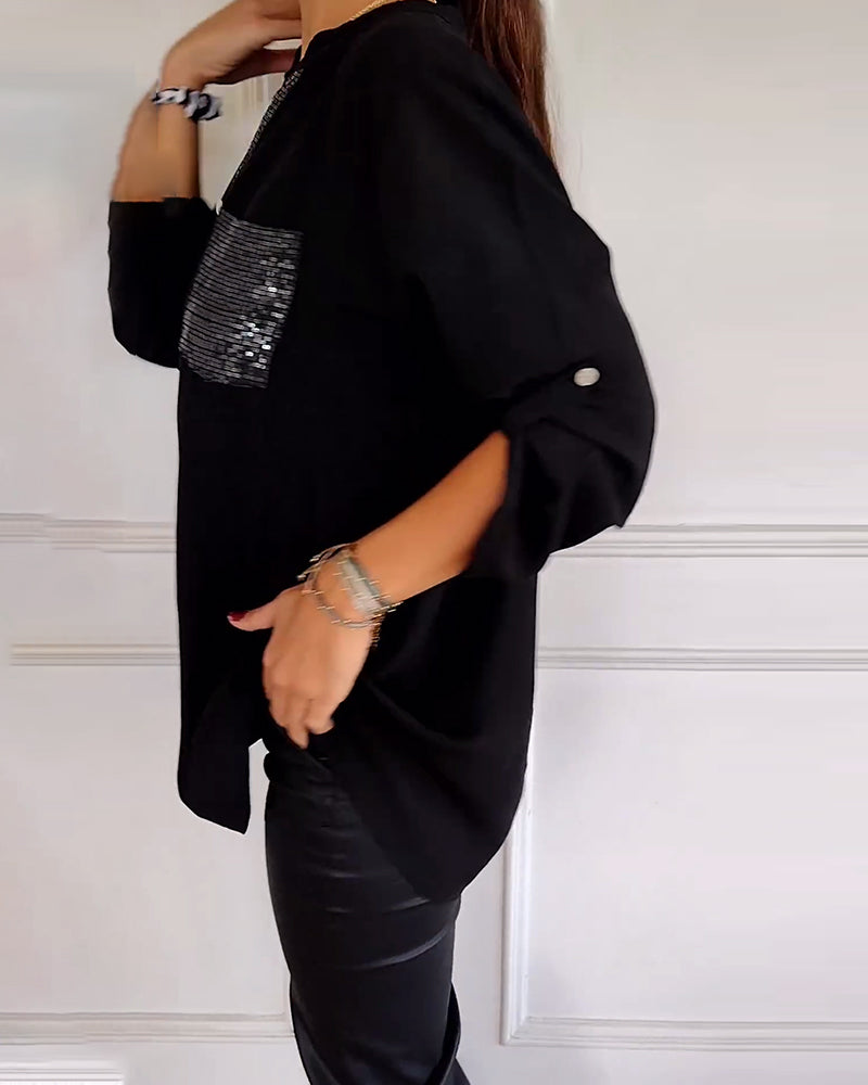 Top casual con paneles y botones con lentejuelas