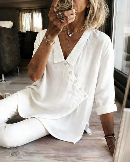 Blusa con cuello y botonadura diagonal asimétrica