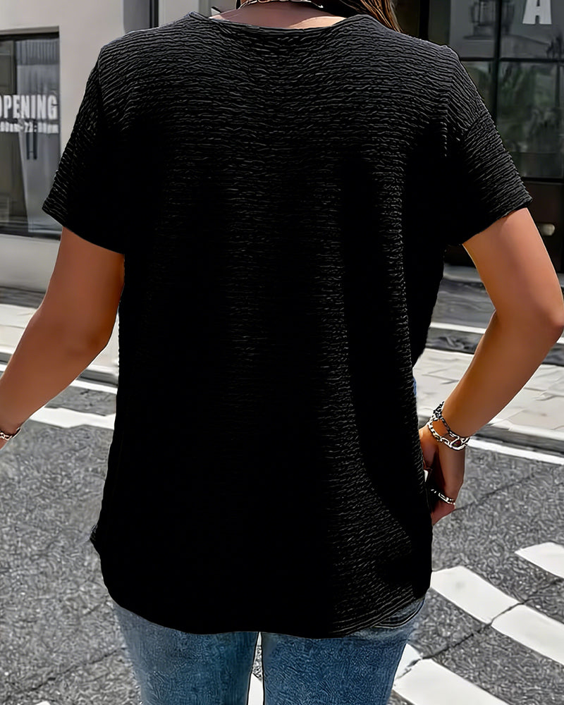 Camiseta con cuello Peter Pan y tres botones