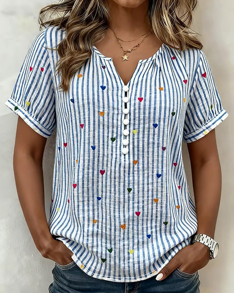 Blusa de mangas abullonadas a rayas con corazón