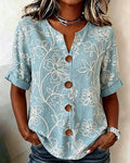 Blusa con escote en V estampado de peonía y botones