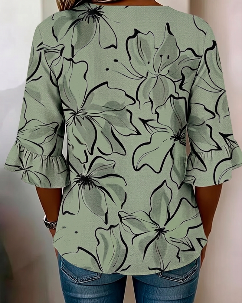 Blusa con escote en V, estampado floral y volante, manga 3/4