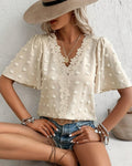 Blusa jacquard con manga volante