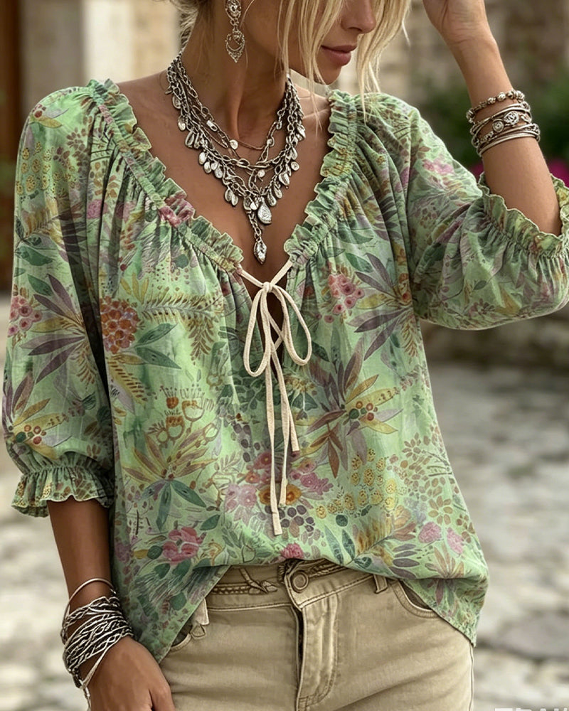 Blusa con escote en V y lazos