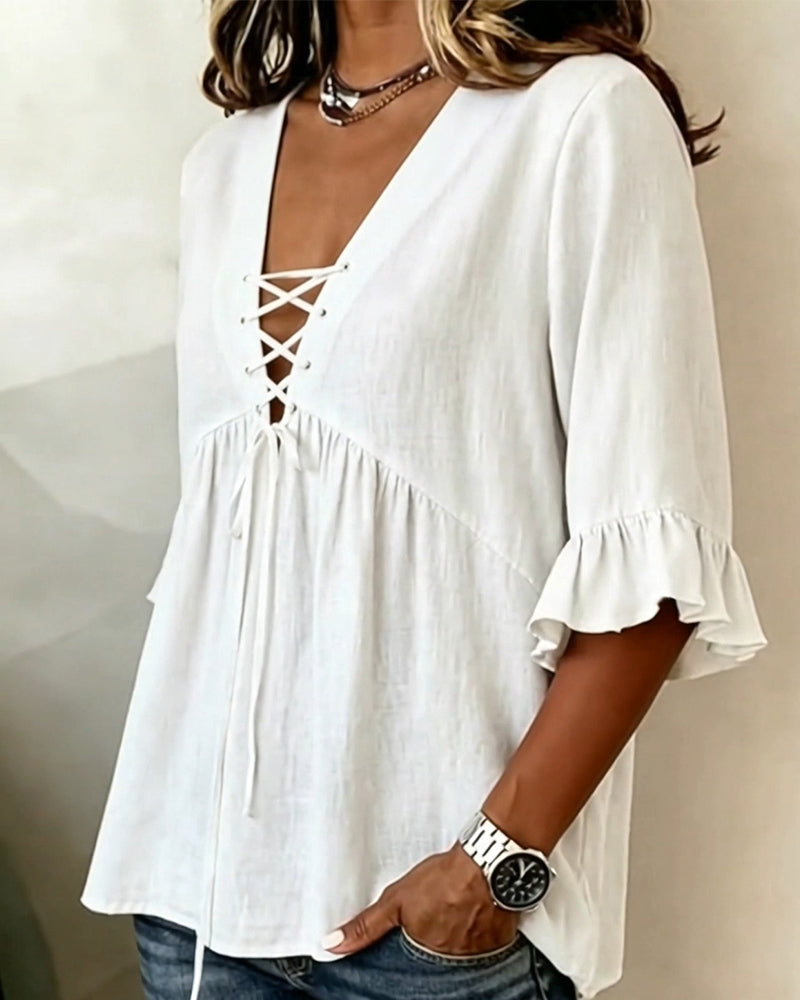 Blusa Unie con escote en V y volantes