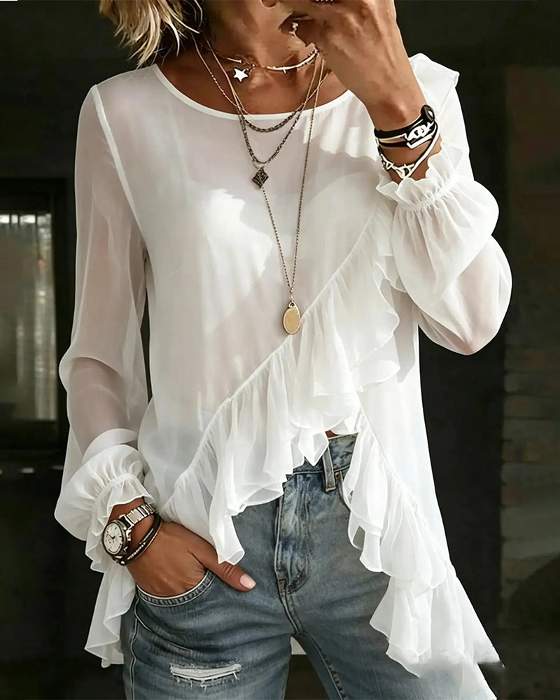 Blusa de corte en sesgo con volante y manga larga