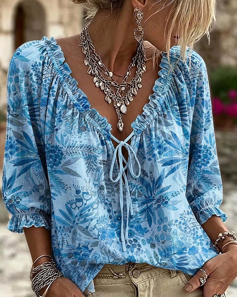 Blusa con escote en V y lazos