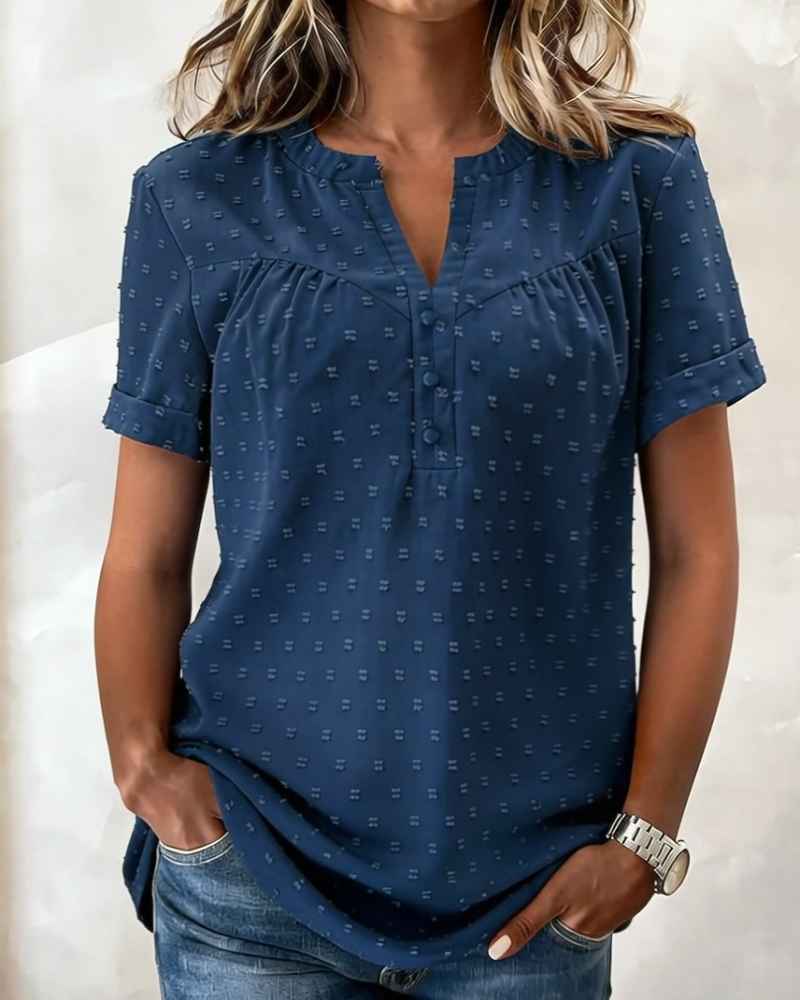 Blusa jacquard con cuello en V y tapeta parcial de manga corta