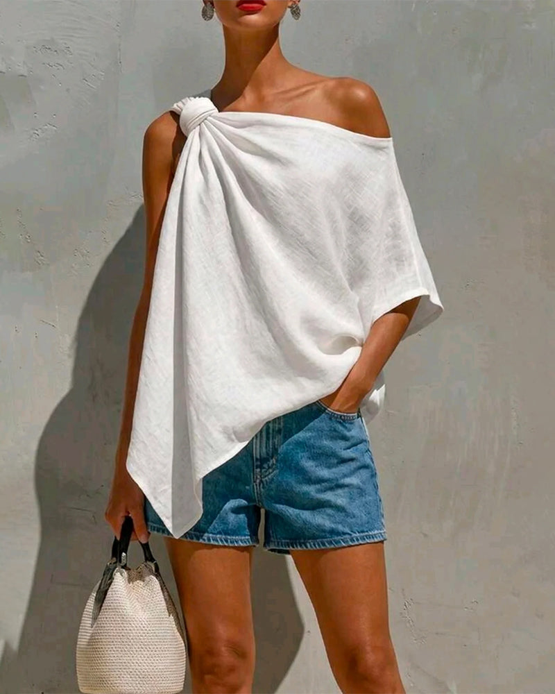 Blusa de un solo hombro con nudo asimétrico