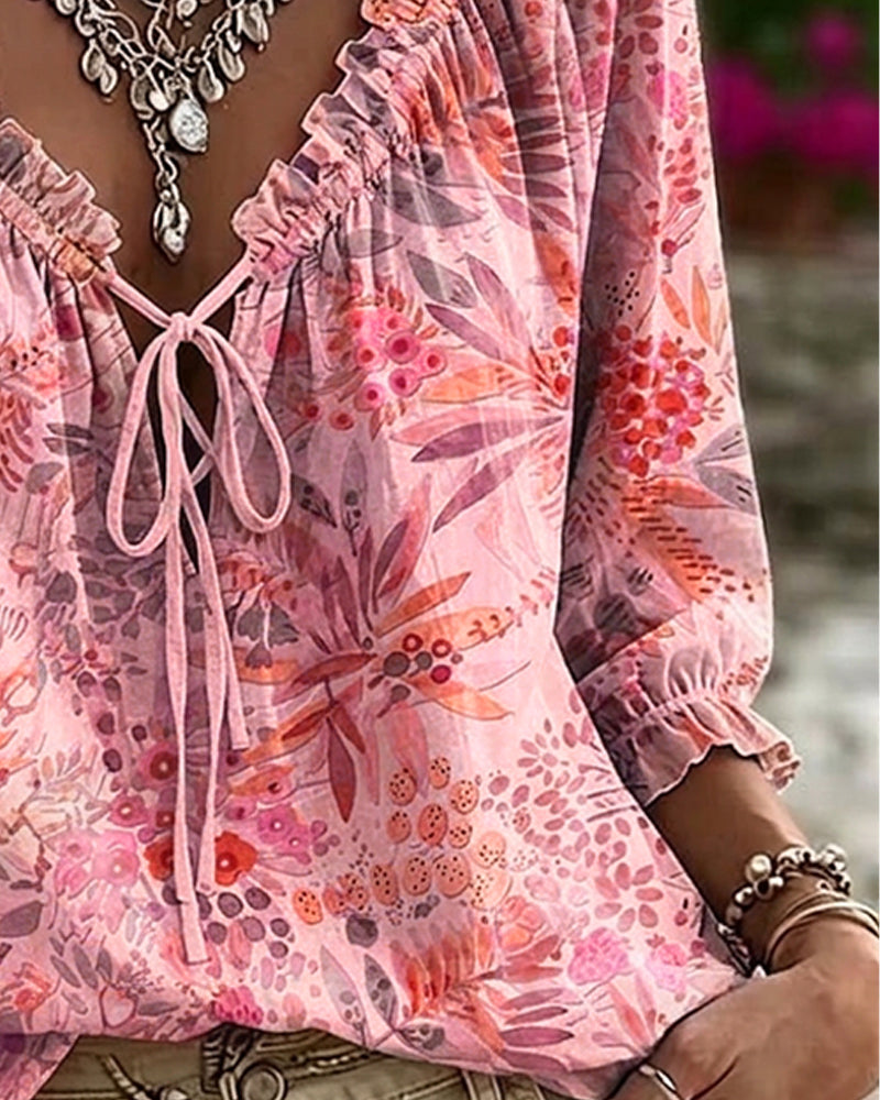 Blusa con escote en V y lazos