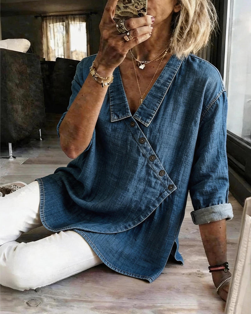 Blusa lisa con botones diagonales, cuello y mangas largas